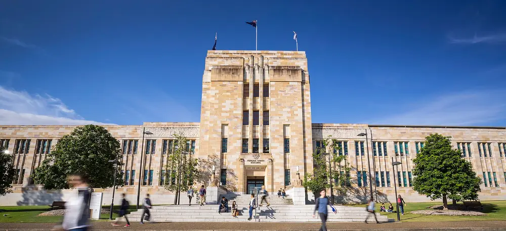 The iconic sandstone Forgan Smith Building fronting the Great Court at the University of Queensland's St Lucia campus in Brisbane, Australia — the university that hosts the UQ School of Dentistry.